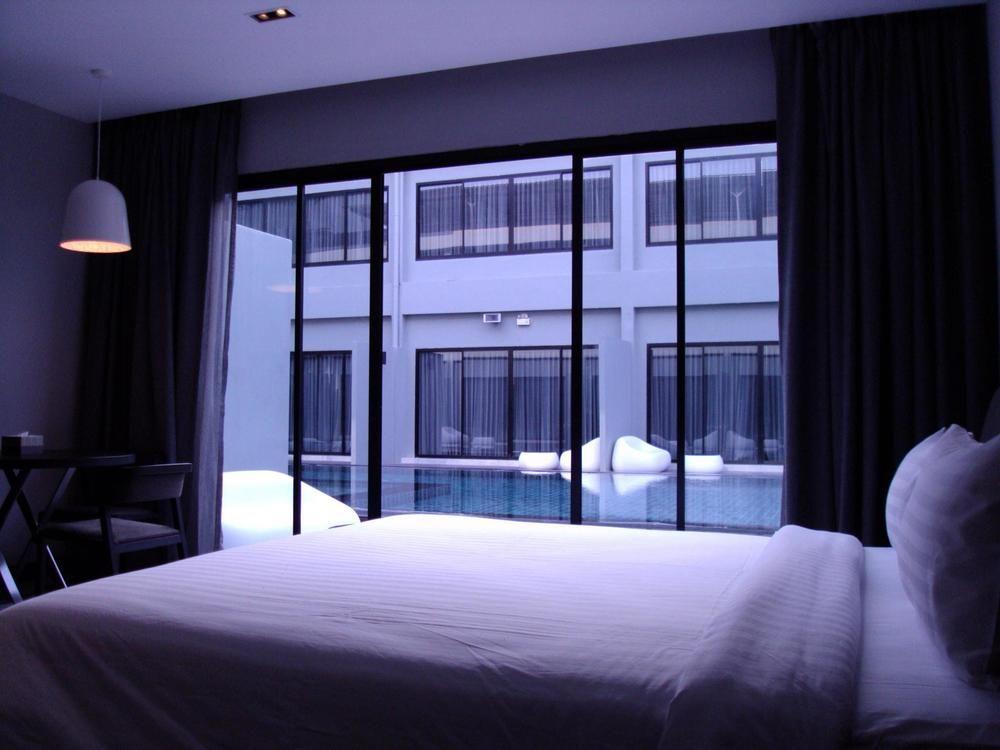 S Ratchada Leisure Hotel - Sha Plus 曼谷 外观 照片 A bedroom at the hotel